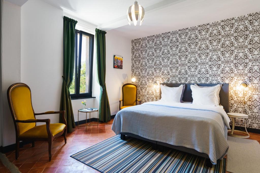 Postel nebo postele na pokoji v ubytování Logement Onze Chambres & Gîtes