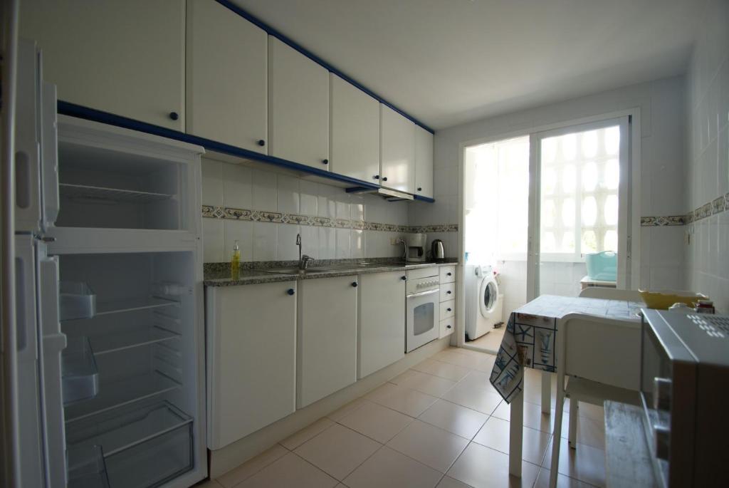 Kuchyňa alebo kuchynka v ubytovaní Appartement Orly