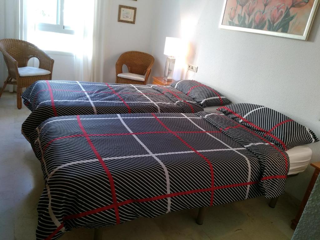 Posteľ alebo postele v izbe v ubytovaní Appartement Orly
