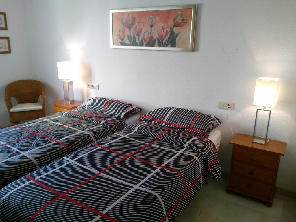 Posteľ alebo postele v izbe v ubytovaní Appartement Orly