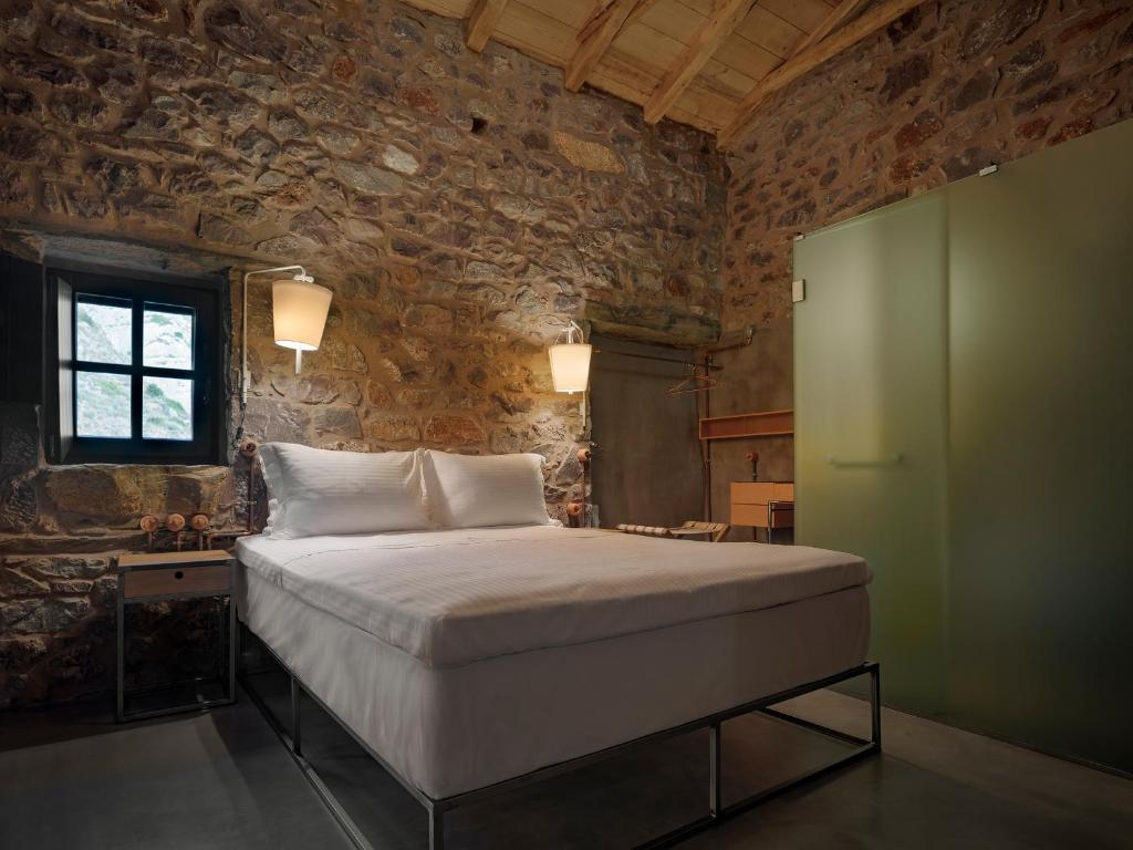 Postel nebo postele na pokoji v ubytování Tainaron Blue Retreat