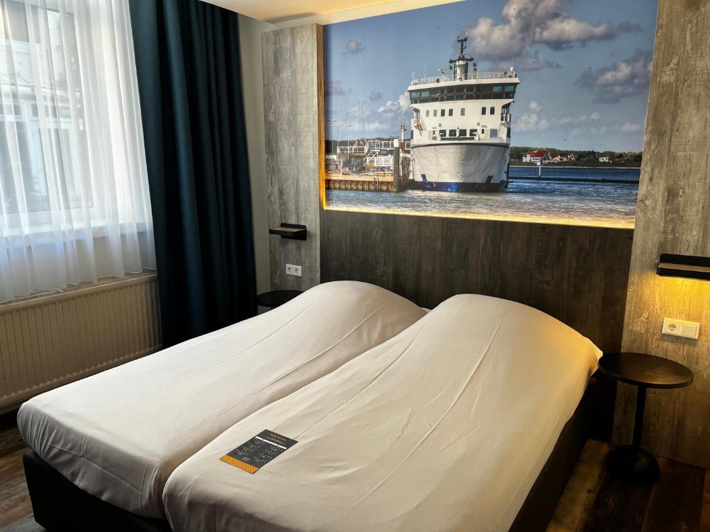 Postel nebo postele na pokoji v ubytování Hotel Nap