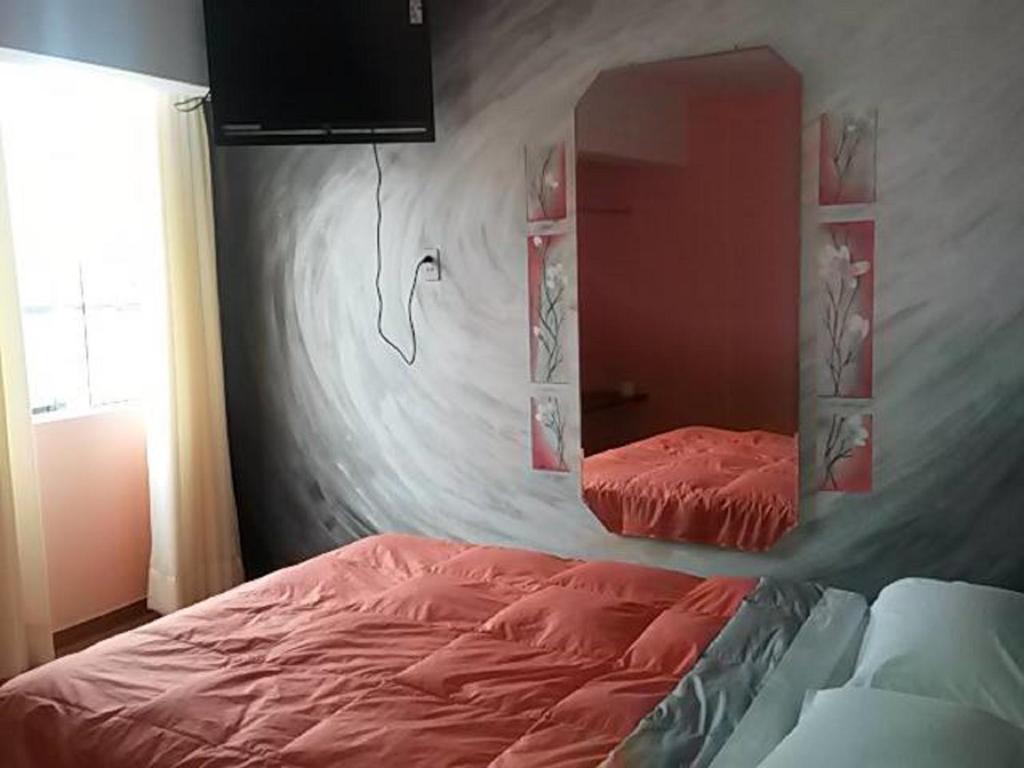 Postel nebo postele na pokoji v ubytování La Posada del Rey - Lima Airport Hostel