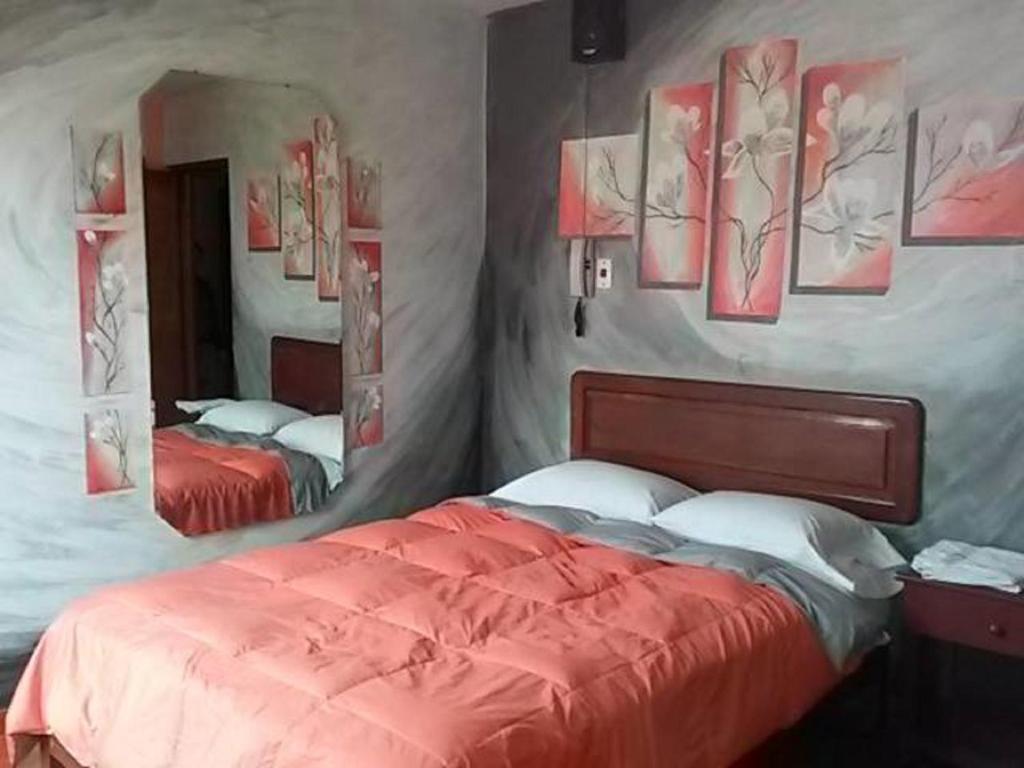 Postel nebo postele na pokoji v ubytování La Posada del Rey - Lima Airport Hostel