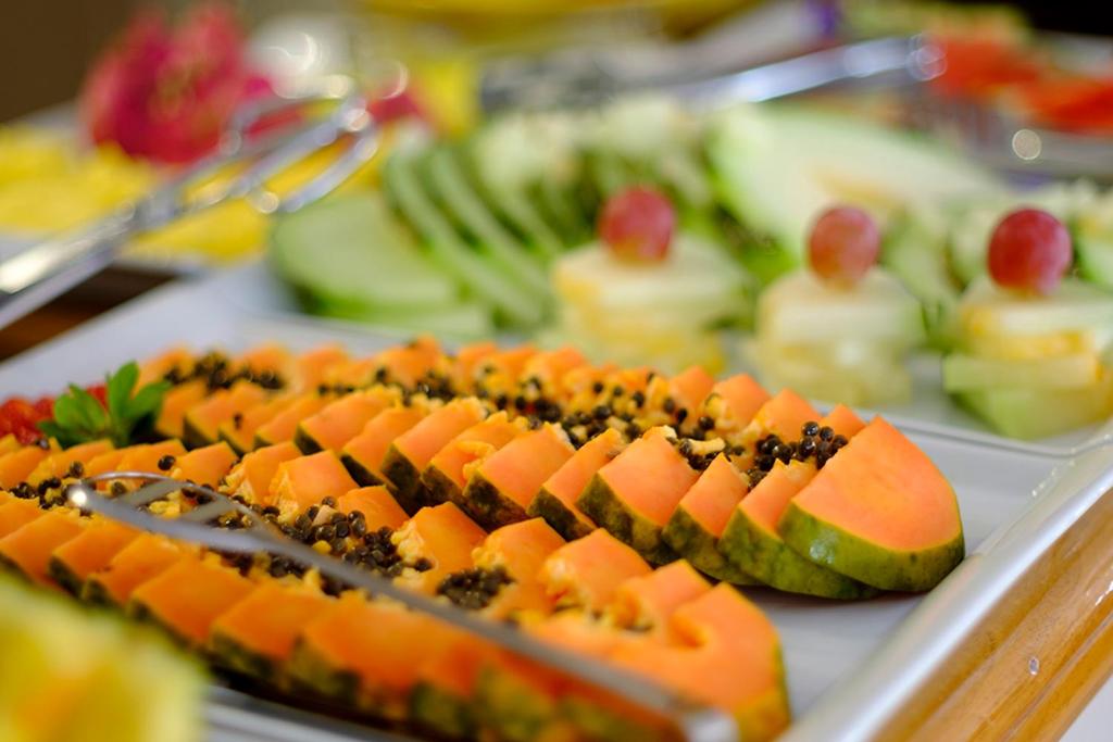 a plate of food on a table with sushi at miKasa Agua Amarga & SPA in Agua Amarga