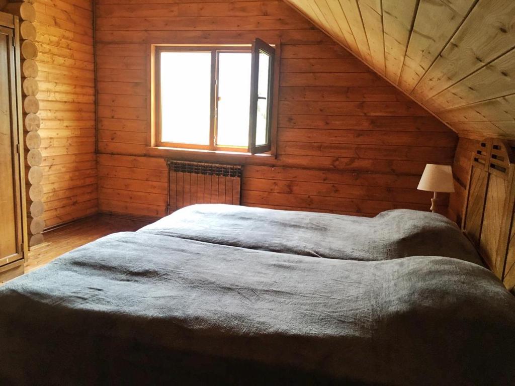 Postel nebo postele na pokoji v ubytování Ranger Campus Eco Lodge
