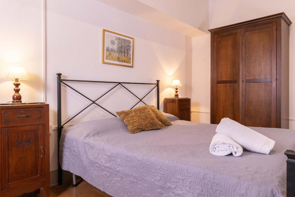 Posteľ alebo postele v izbe v ubytovaní Antico Borgo La Torre Agriturismo