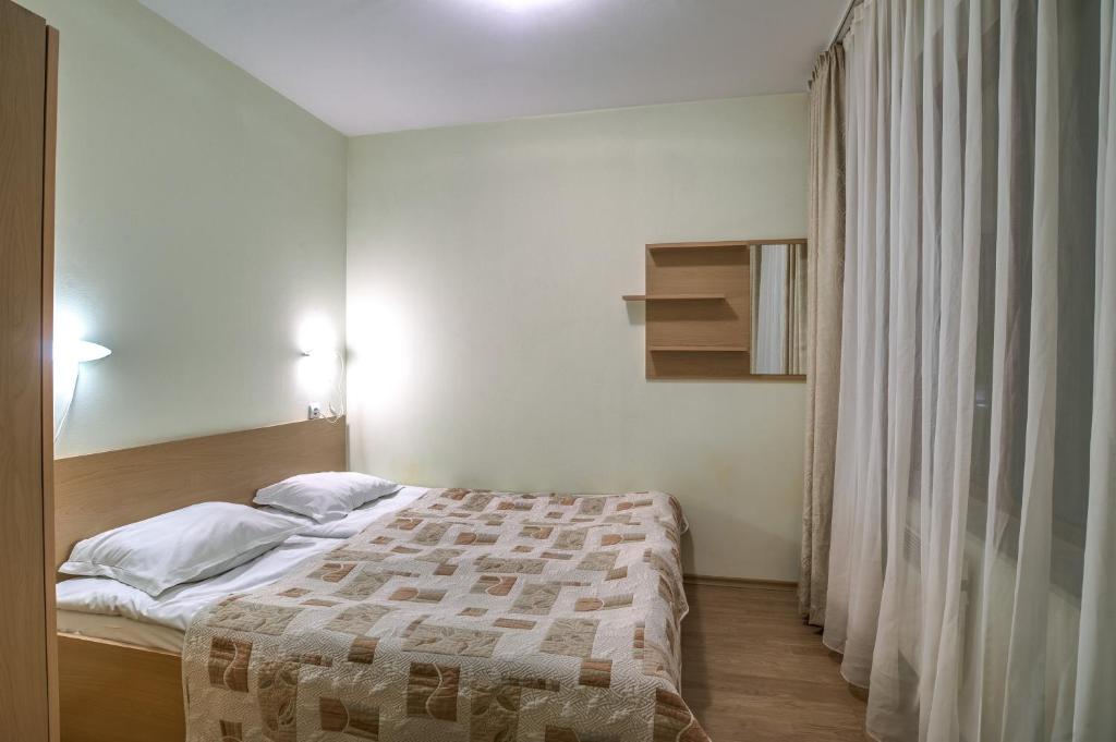 Postel nebo postele na pokoji v ubytování Studio - Apartments Castle Complex 2