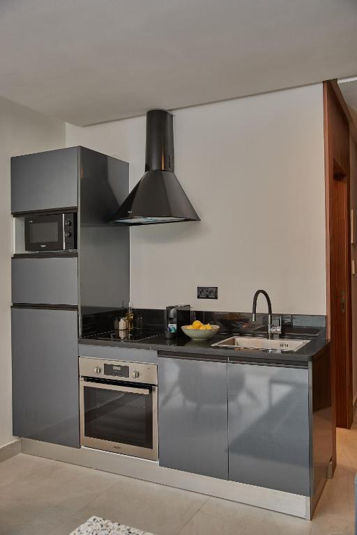 Kuchyň nebo kuchyňský kout v ubytování Stayhere Rabat - Agdal 3 - Prestige Residence