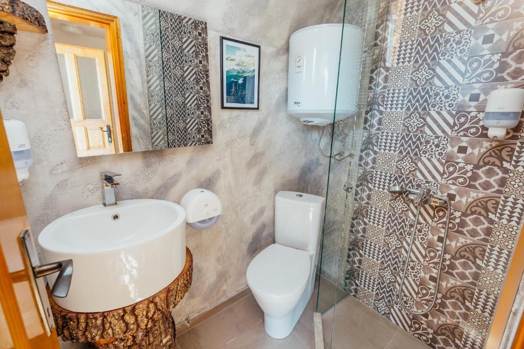Koupelna v ubytování Eco Village Nevidio