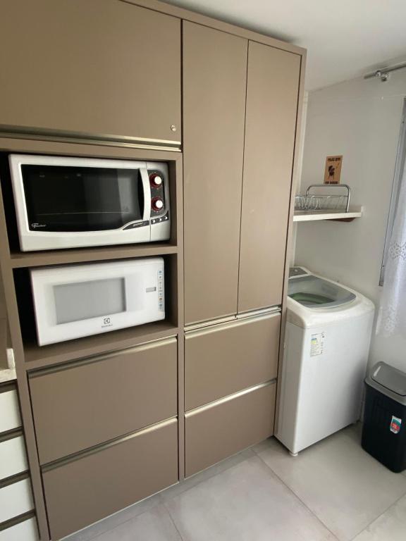 A cozinha ou kitchenette de Prédio frente mar 3 quartos Balneário camboriú BrisaMarBC3