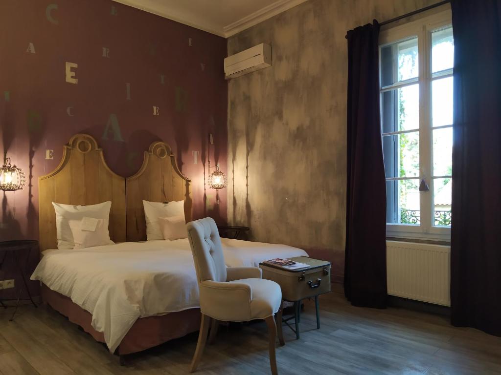 Postel nebo postele na pokoji v ubytování Envie de Sud