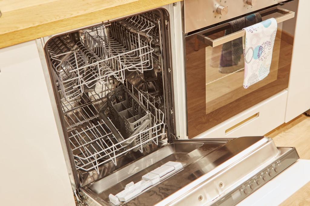 Kuchyňa alebo kuchynka v ubytovaní Apartamentos Orfas