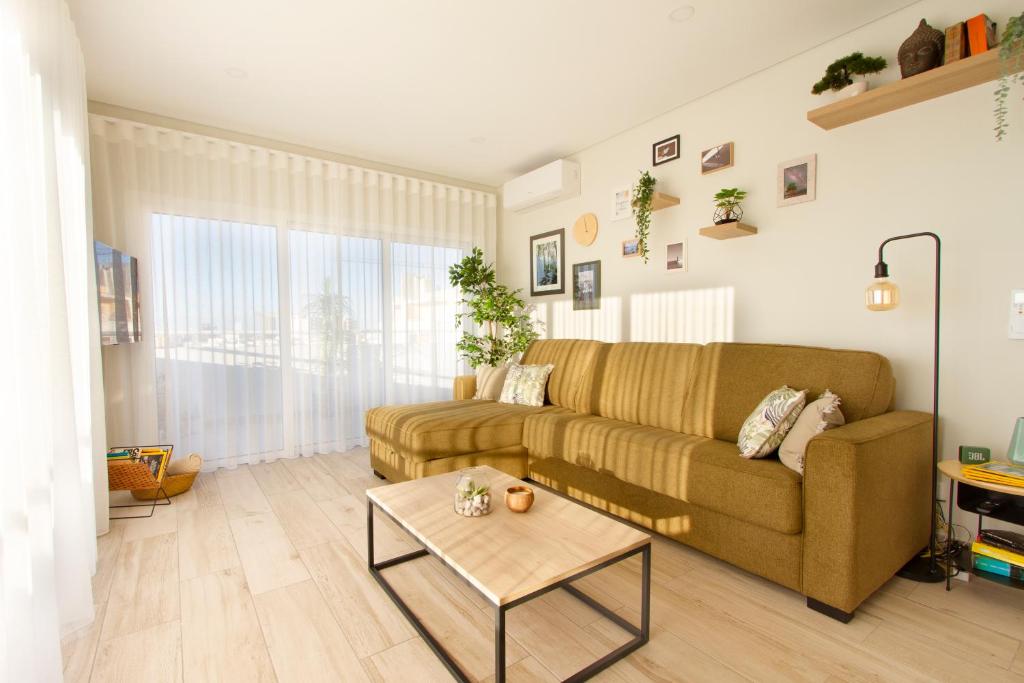 Et opholdsområde på Zen Garden Penthouse