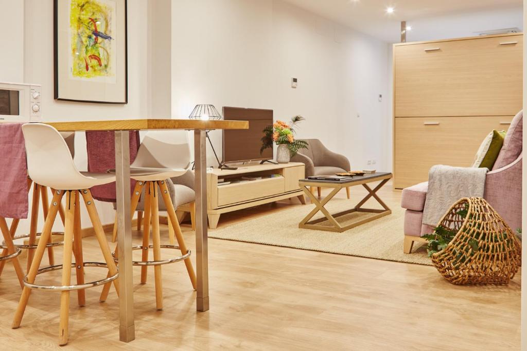 Posteľ alebo postele v izbe v ubytovaní Apartamentos Orfas