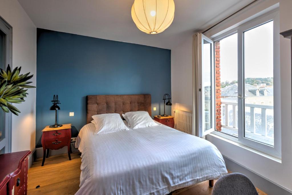 Кровать или кровати в номере Hotel Le Rayon Vert