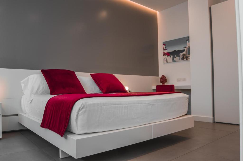 Postel nebo postele na pokoji v ubytování FuoriSquadra B&B