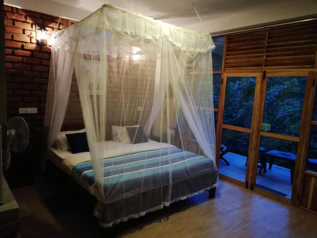 Postel nebo postele na pokoji v ubytování Ayubo Ella - Bed & Breakfast