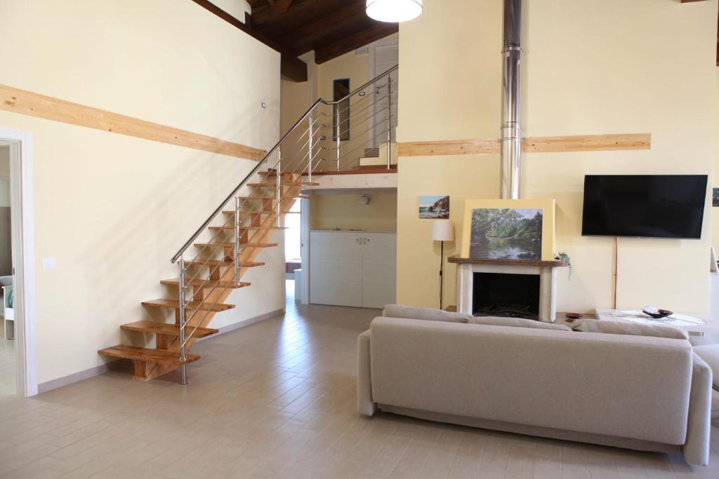 TV a/nebo společenská místnost v ubytování B&B ARCOBALENO