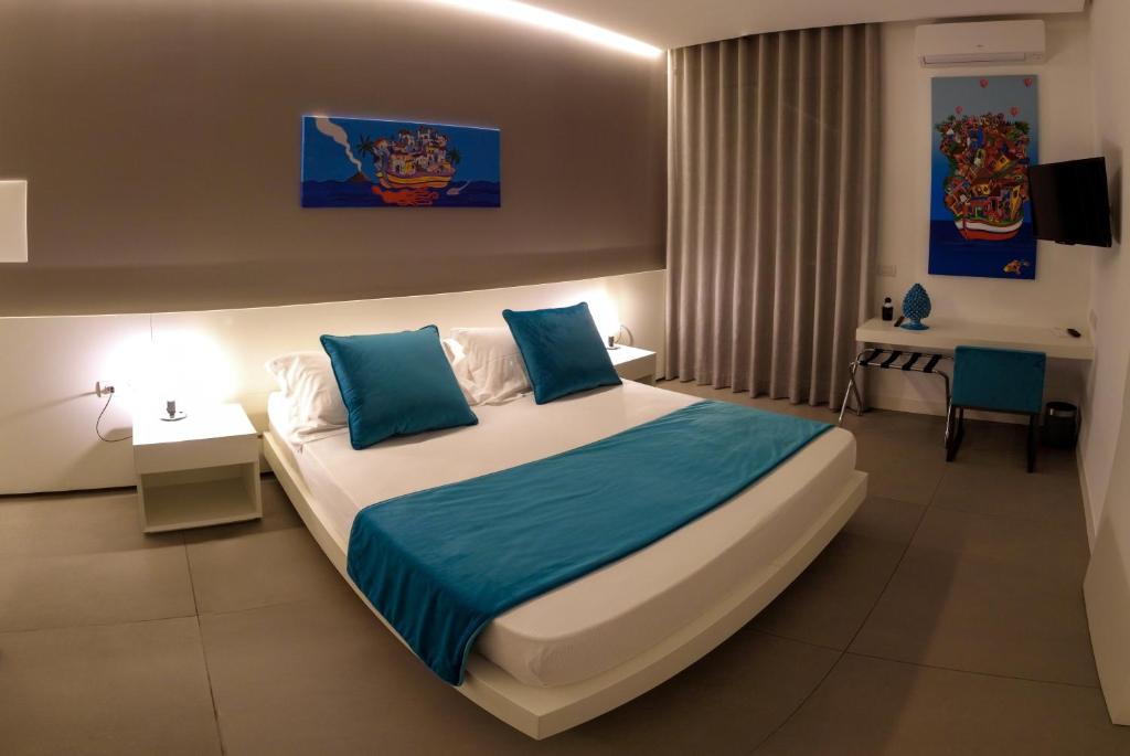 Postel nebo postele na pokoji v ubytování FuoriSquadra B&B