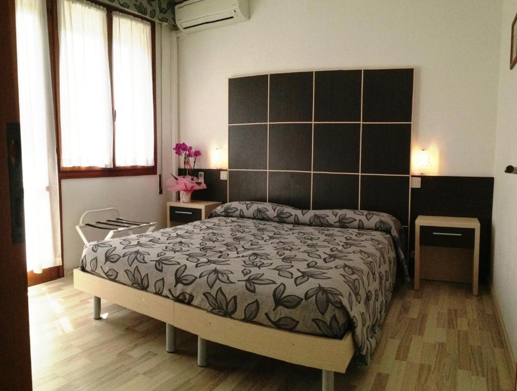 Postel nebo postele na pokoji v ubytování Hotel Eden