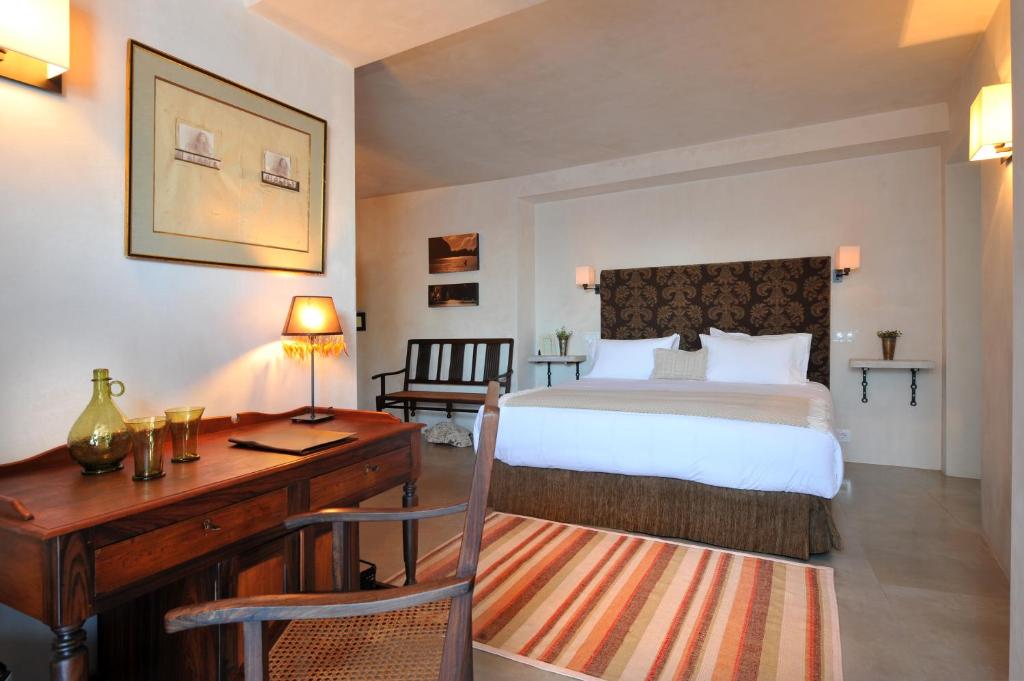 Een bed of bedden in een kamer bij Hotel Boutique V