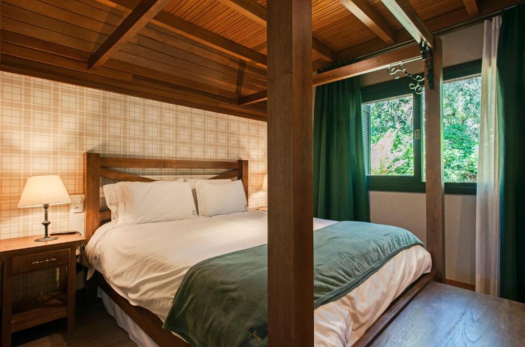 Cama ou camas em um quarto em Hotel Fioreze Chalés