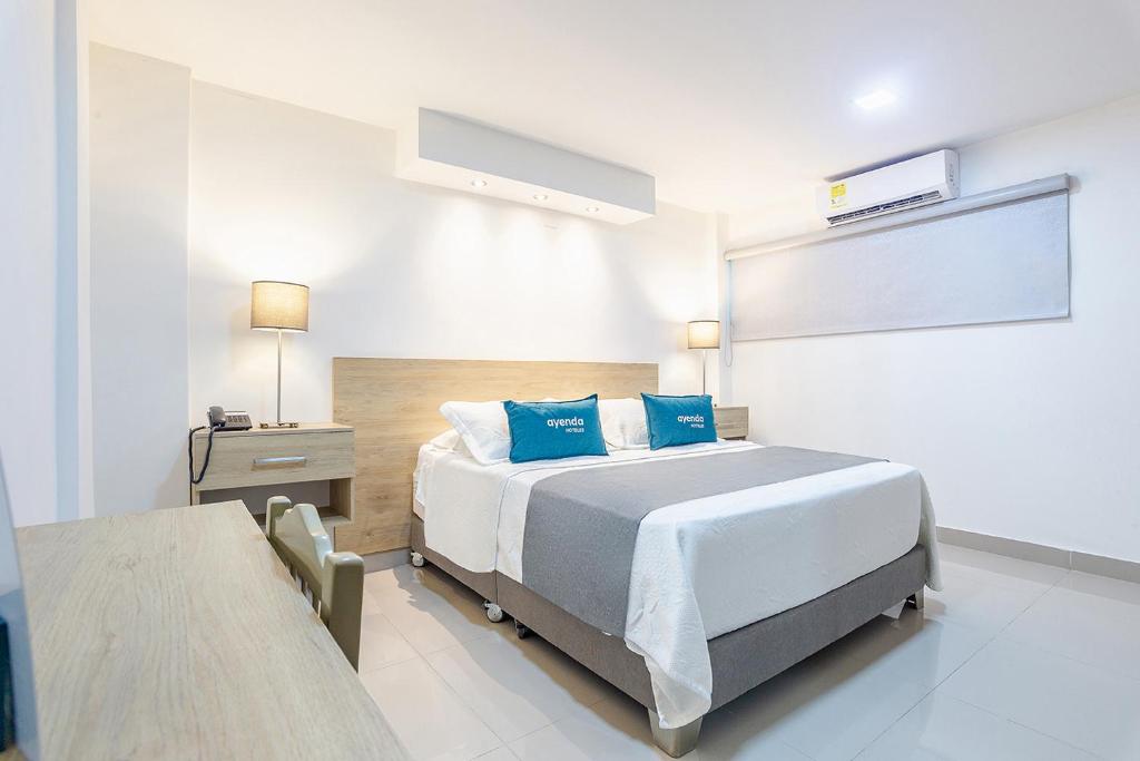 Postel nebo postele na pokoji v ubytování Hotel Ancor