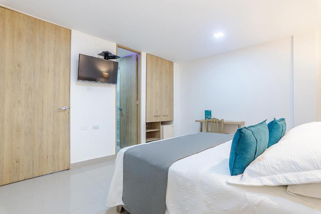 Postel nebo postele na pokoji v ubytování Hotel Ancor