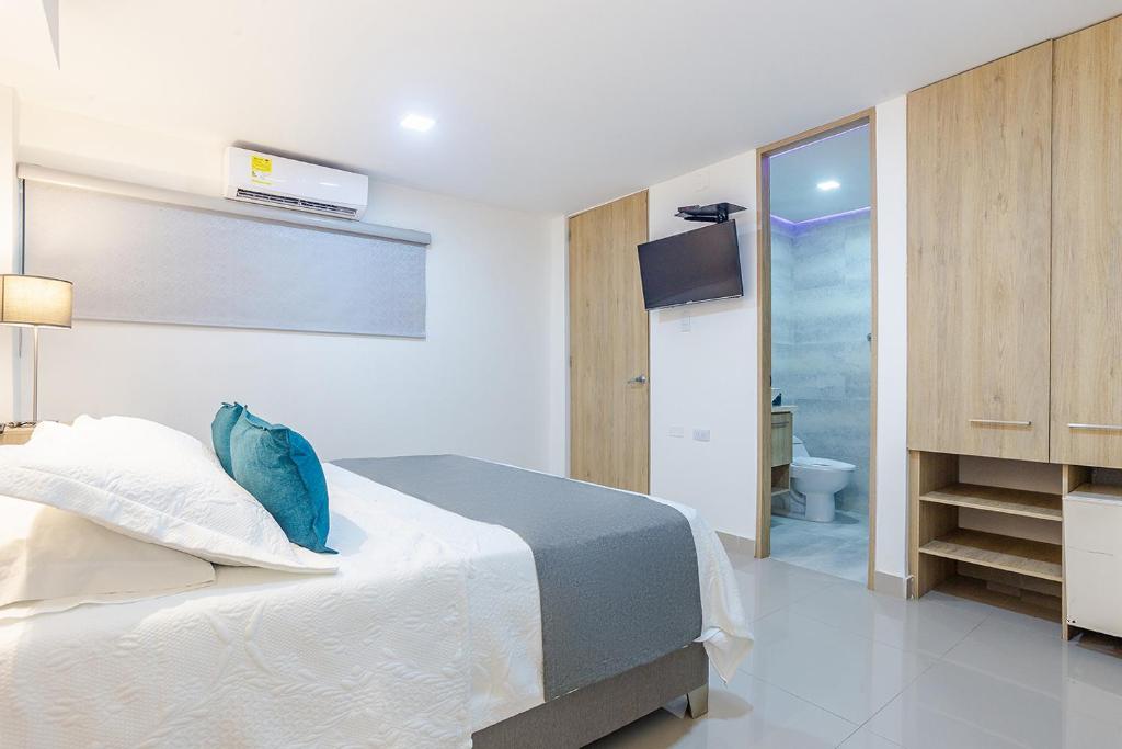 Postel nebo postele na pokoji v ubytování Hotel Ancor