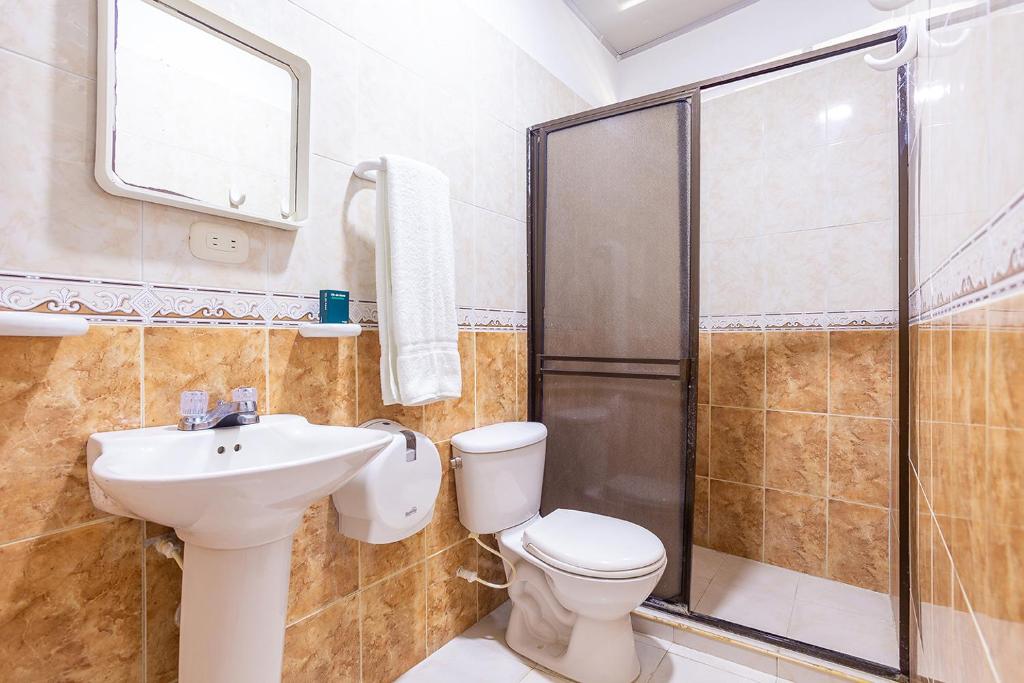 Koupelna v ubytování Hotel Ancor