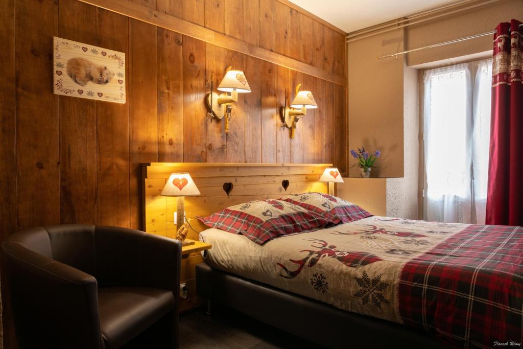 Postel nebo postele na pokoji v ubytování Hôtel Quin Te Va
