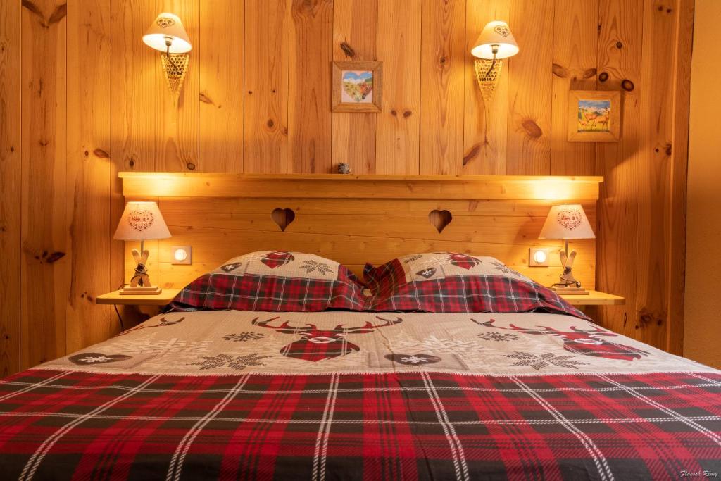 Postel nebo postele na pokoji v ubytování Hôtel Quin Te Va