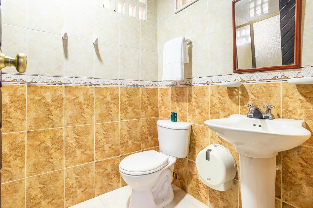 Koupelna v ubytování Hotel Ancor