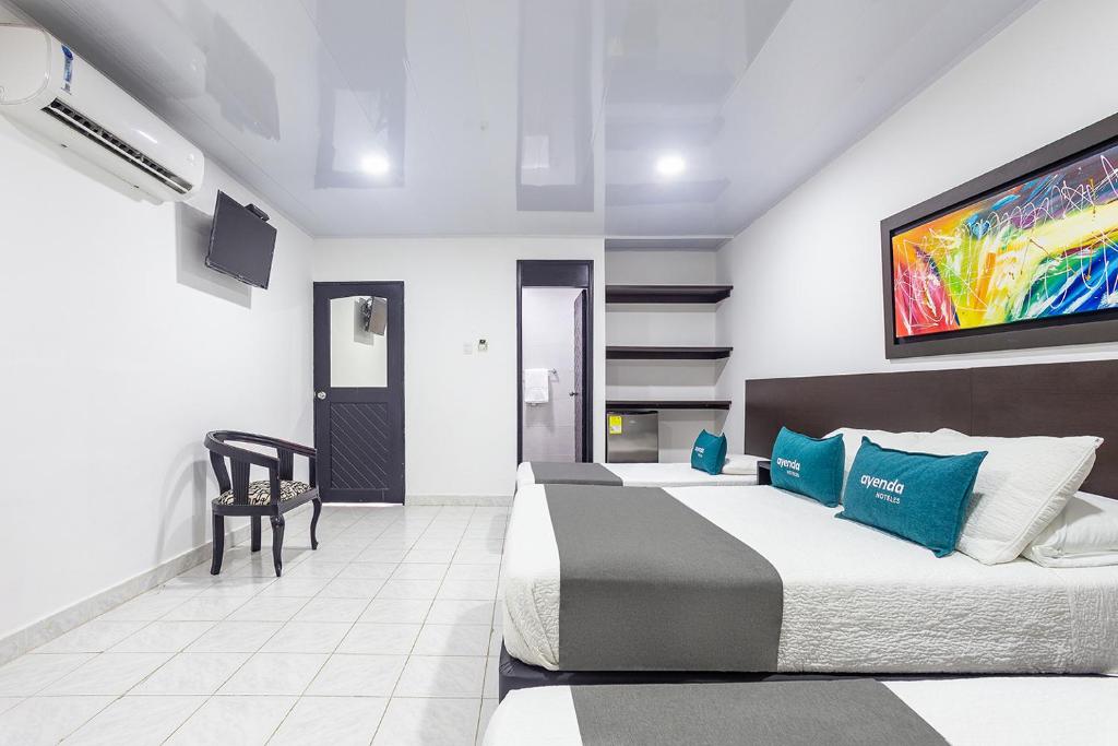 TV a/nebo společenská místnost v ubytování Hotel Ancor