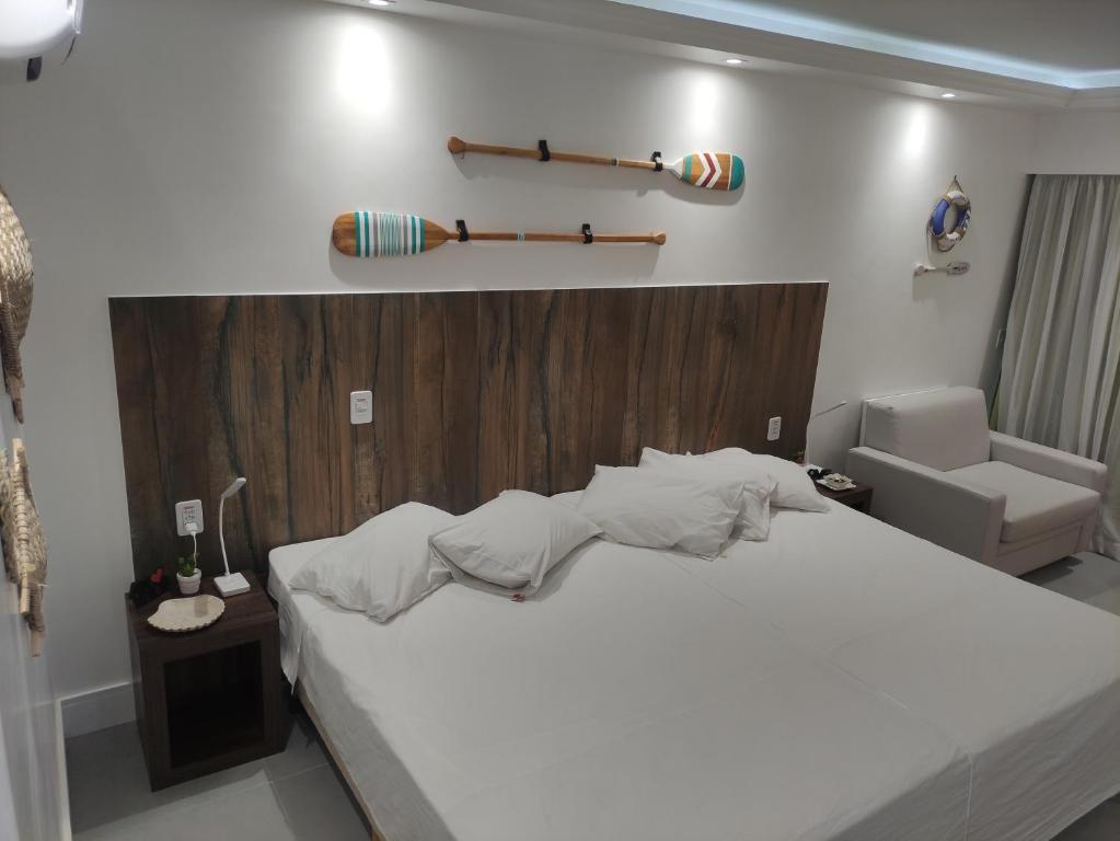 Katil atau katil-katil dalam bilik di Búzios Beach Resort Residencial 1305