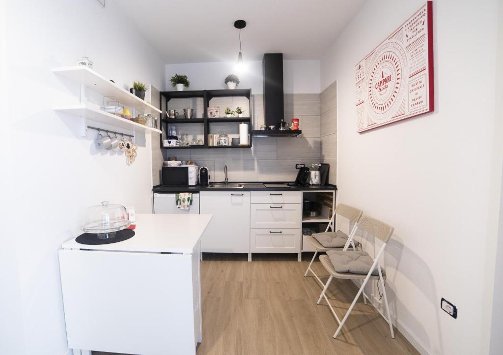 Kuchyň nebo kuchyňský kout v ubytování B&B La Marisa