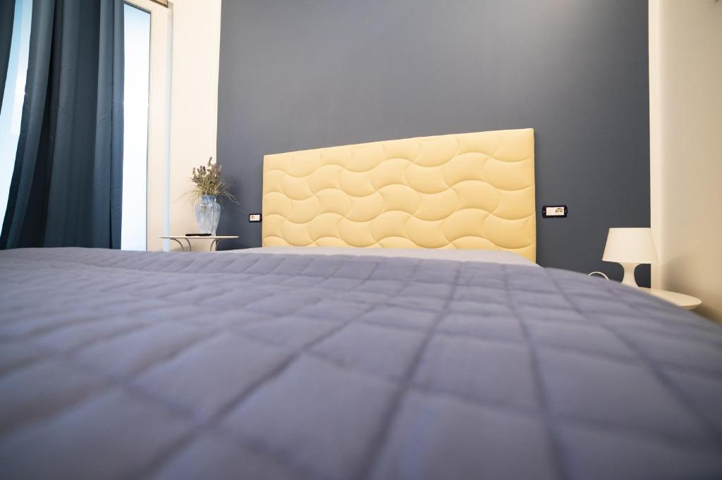 Postel nebo postele na pokoji v ubytování B&B La Marisa