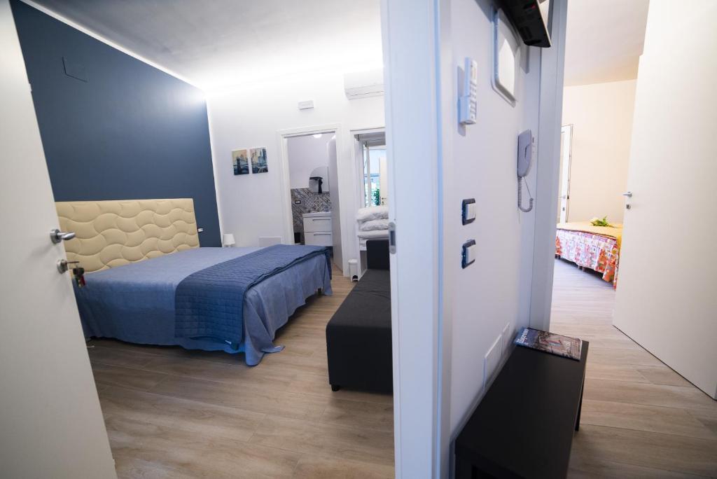 Postel nebo postele na pokoji v ubytování B&B La Marisa