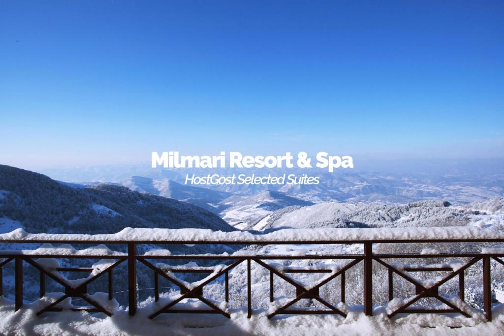 科帕奥尼克Milmari Resort & Spa Suites的享有山区度假胜地和雪地Spa的景色