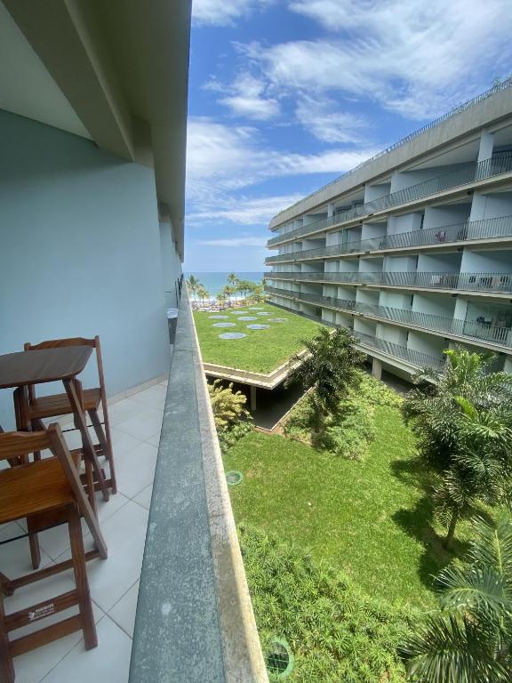 a view from the balcony of a building at DNA UBATUBA in Ubatuba