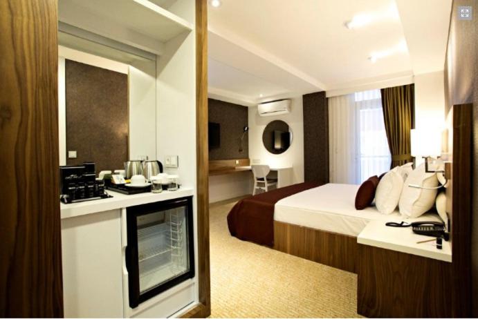 Kuchyň nebo kuchyňský kout v ubytování Endglory Hotel