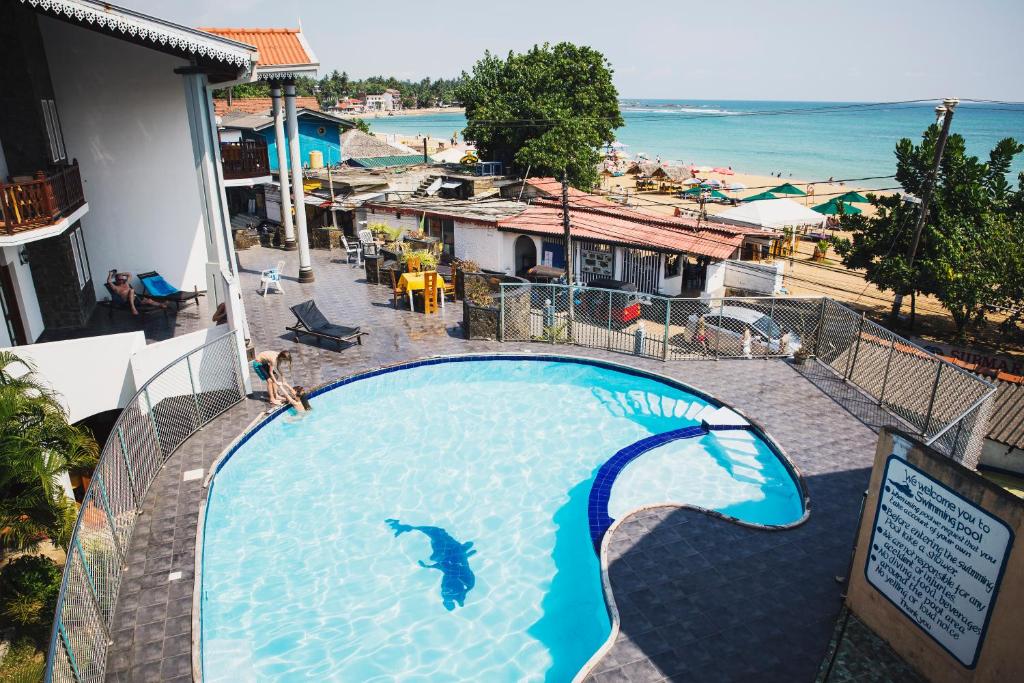 Bazén v ubytování Hotel Neptune Bay unawatuna beach nebo v jeho okolí