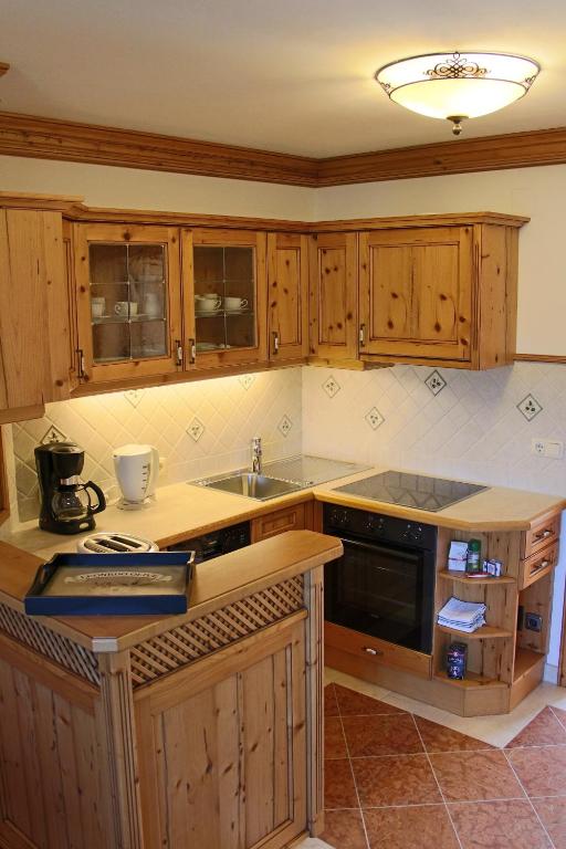 Cucina o angolo cottura di Ferienwohnung Schossleitner - der Wohlfühl-Ansitz am Wolfgangsee mit Weitblick