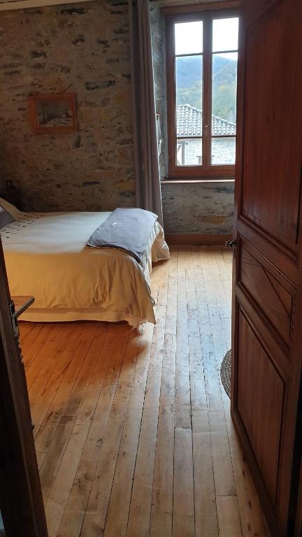Postel nebo postele na pokoji v ubytování chambre et table d'hôtes La Grande Ourse
