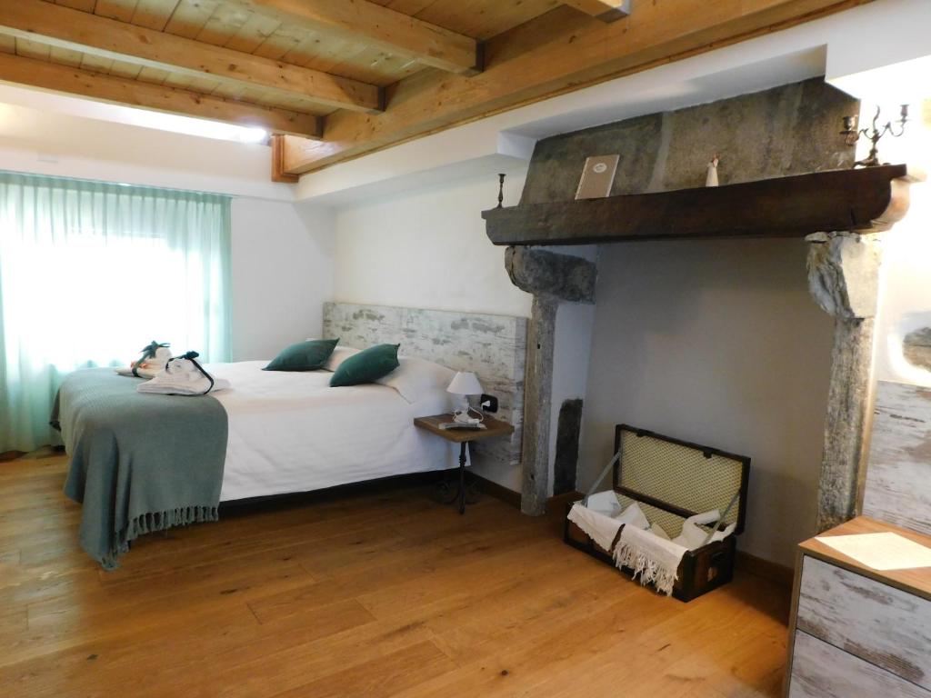 Postel nebo postele na pokoji v ubytování NicoMat Rooms