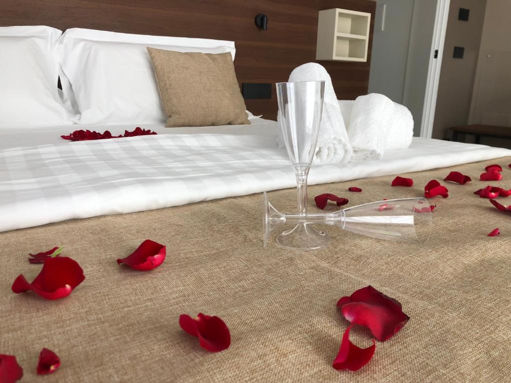 Łóżko lub łóżka w pokoju w obiekcie B&B BorgiaRooms