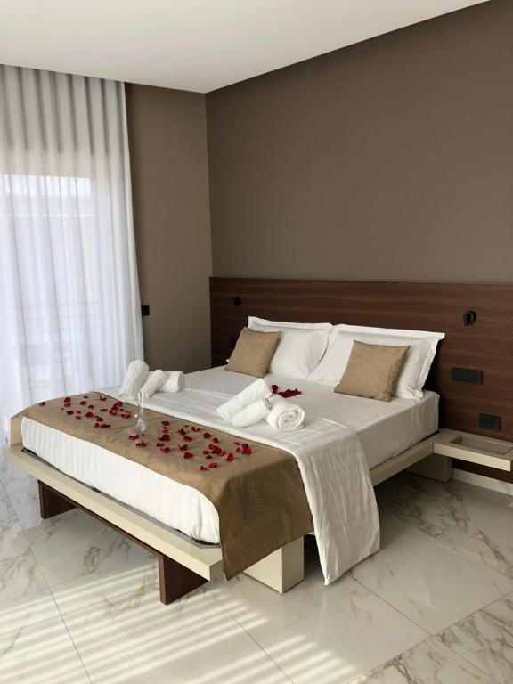 Łóżko lub łóżka w pokoju w obiekcie B&B BorgiaRooms