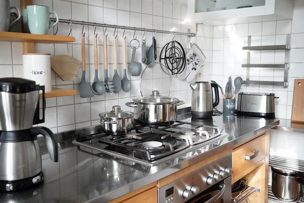 Kuchyň nebo kuchyňský kout v ubytování Stadthuuske