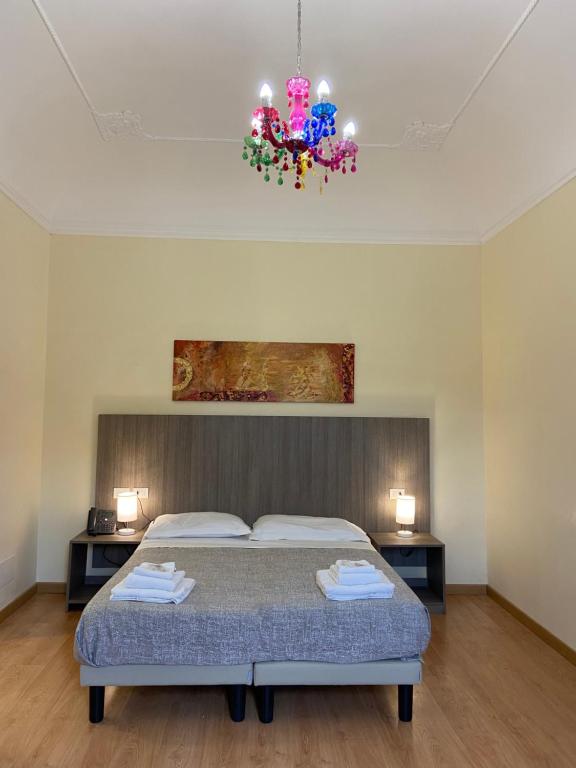 Postel nebo postele na pokoji v ubytování 55 Aira Hotel